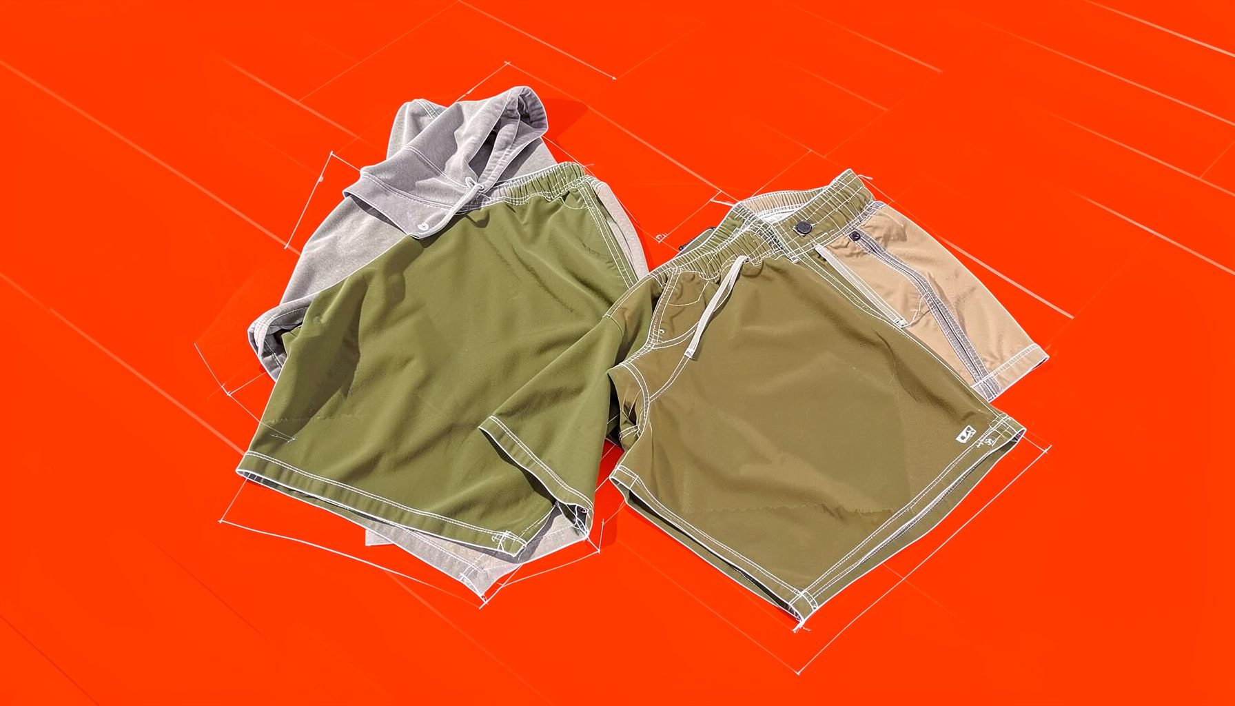 Mens chino shorts in olive and khaki, paired with a lightweight hoodie, arranged on a sun-bleached deck